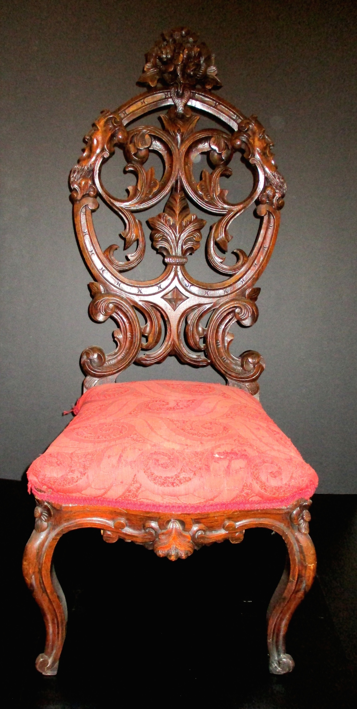 Lady's Rosewood Chair w/Carved Heads on the Sides of the Back