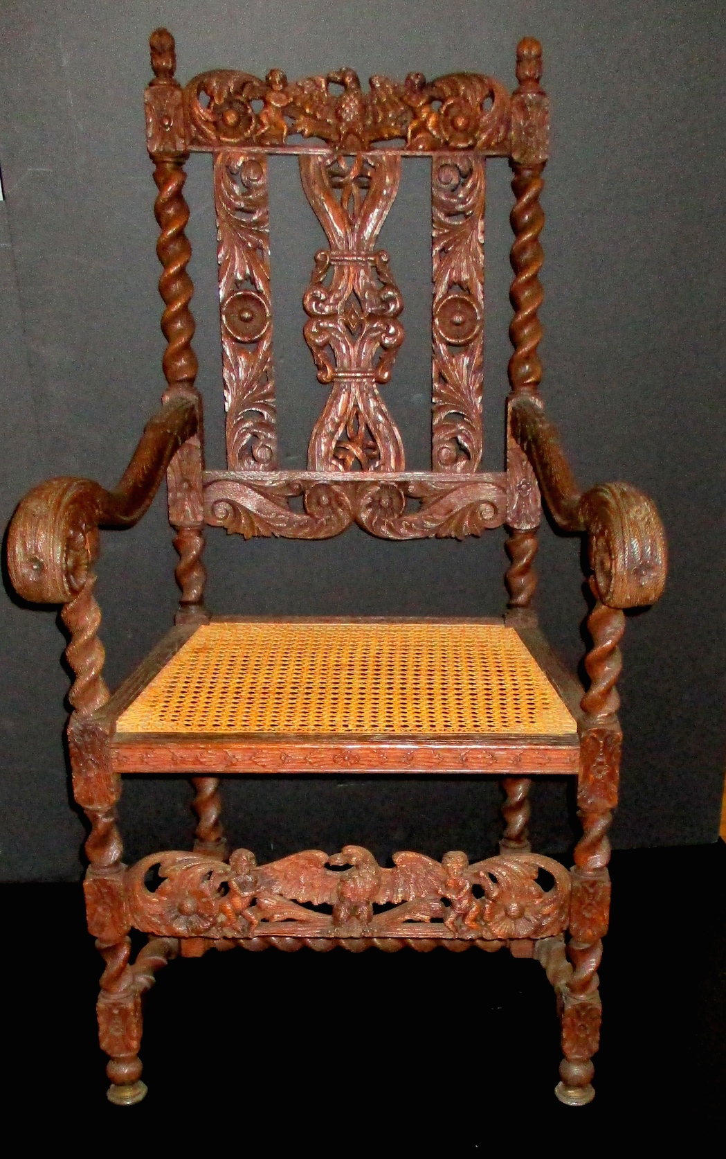 Highly Carved Oak Throne Chair w/Cane Seat (23 1/2" D x 25" W x 35" H)