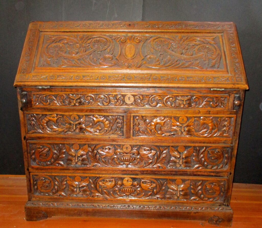 Heavily Carved European Oak Drop Front Desk w/Mythological Faces (43" w x 22" D x 41"H)