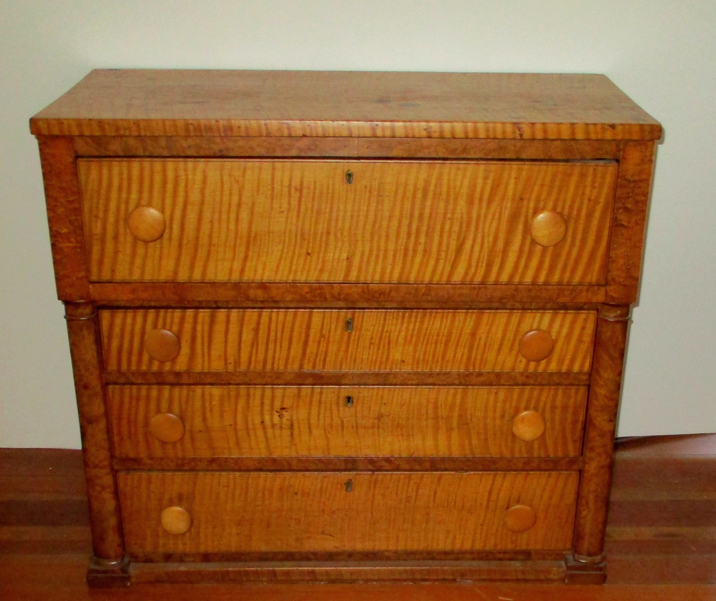 Mid-size Early 19th Century 4-Drawer Curly Maple Chest (22" W x 39" H x 24" D)