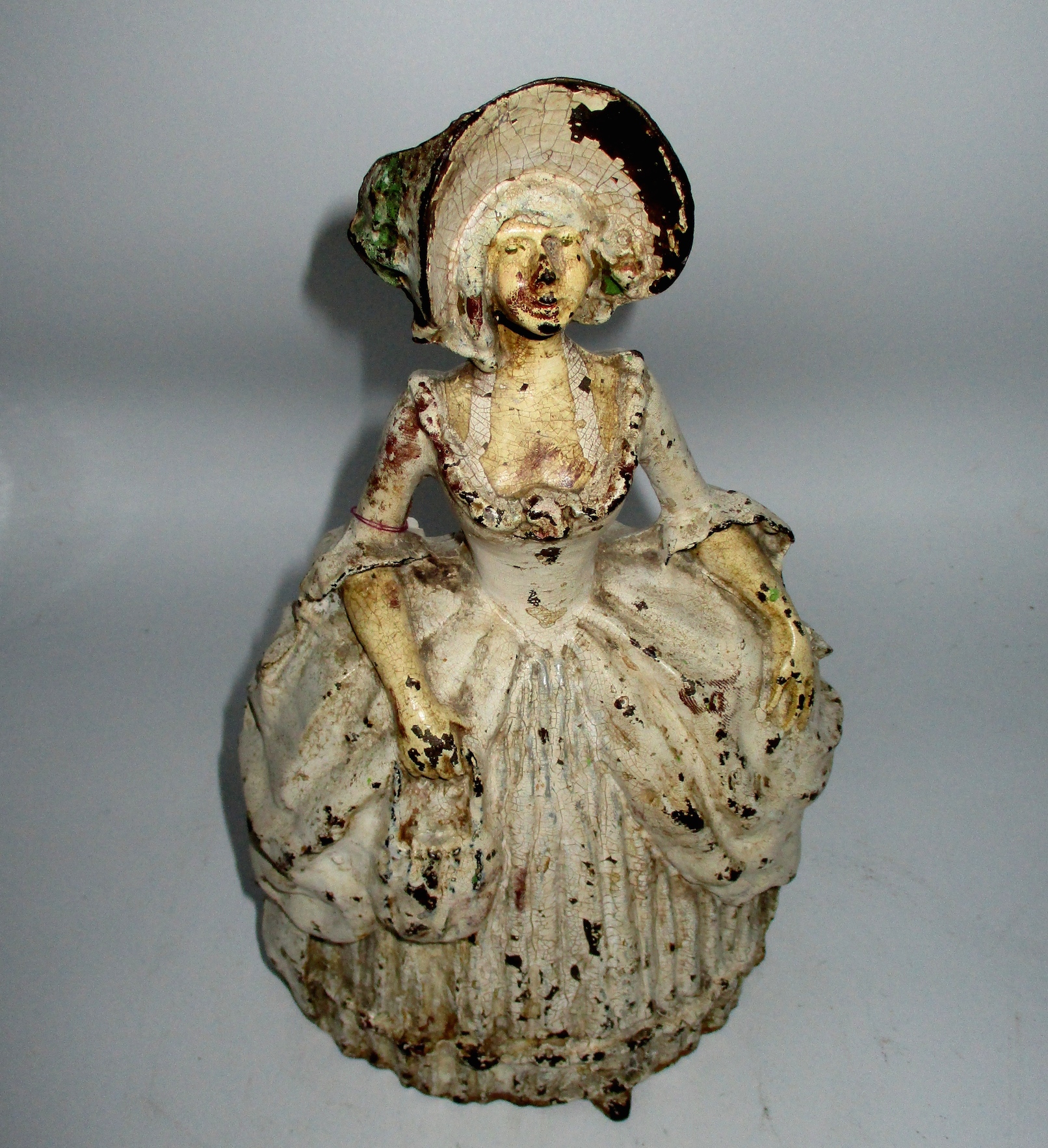 Painted Cast Iron Colonial Woman Doorstop