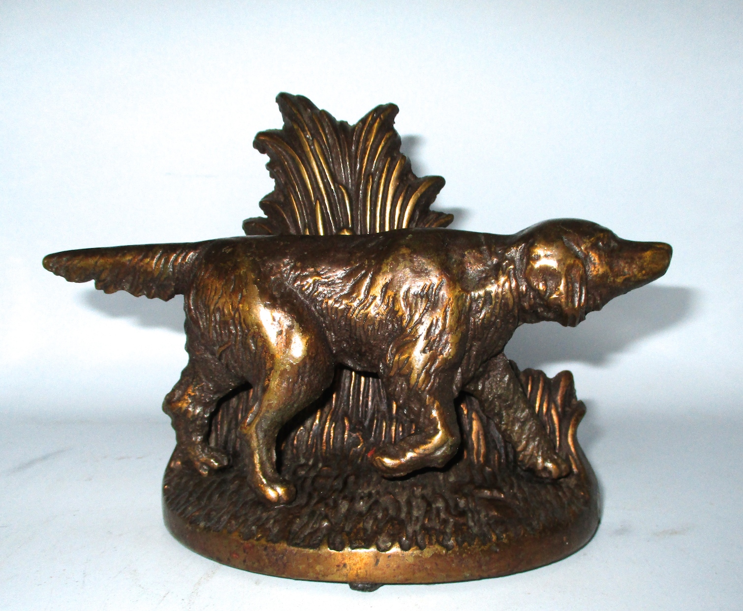 One of a Pair of Copper-plated Cast Iron Setter Bookends