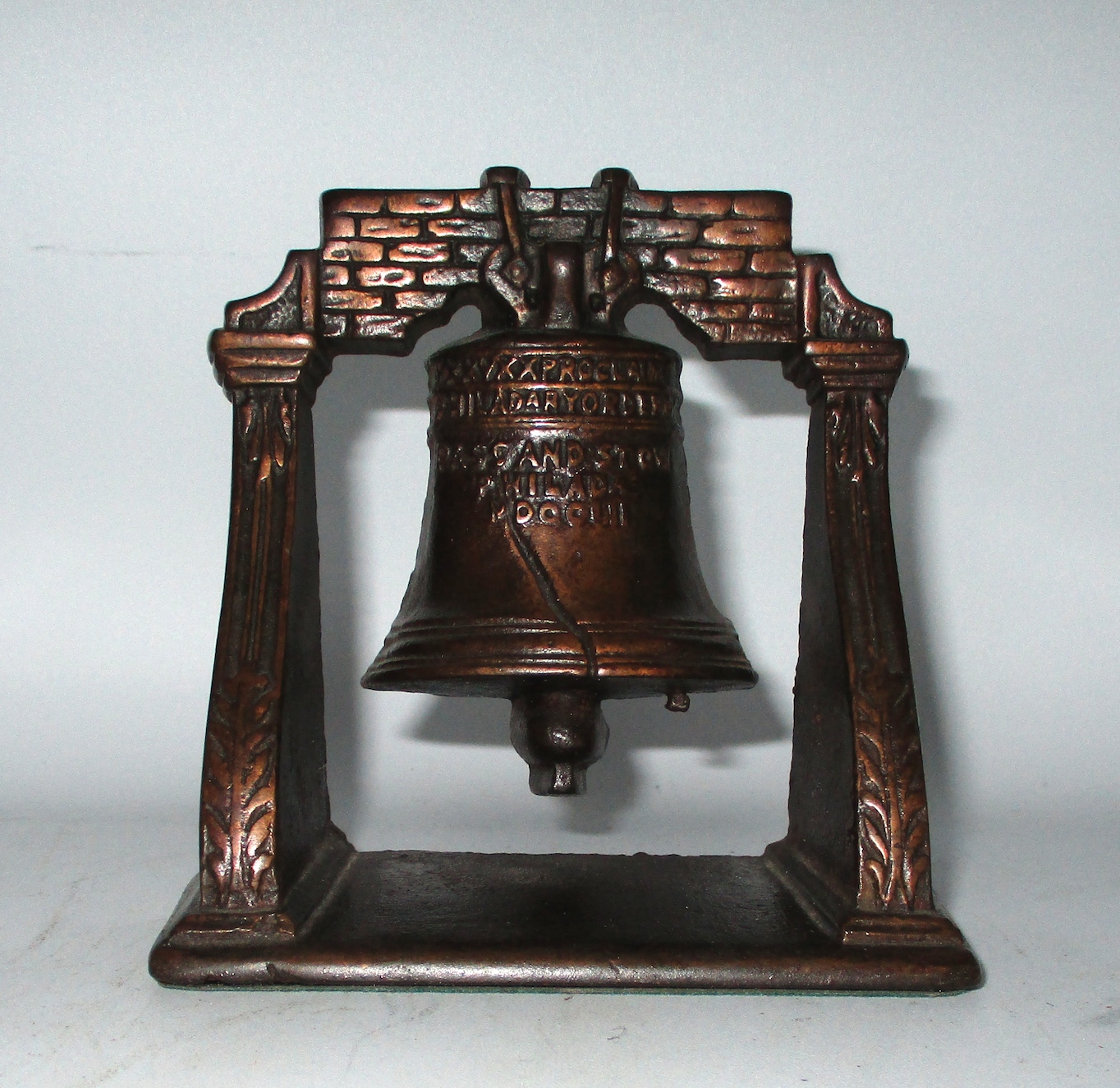 One of a Pair of Copper-plated Cast Iron Liberty Bell Bookends