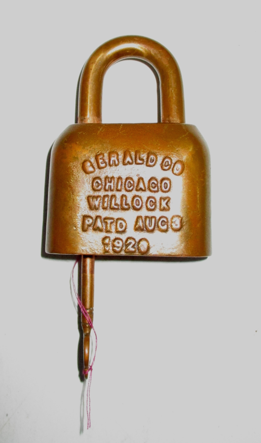 Copper-plated Gerald Co. Lock w/key