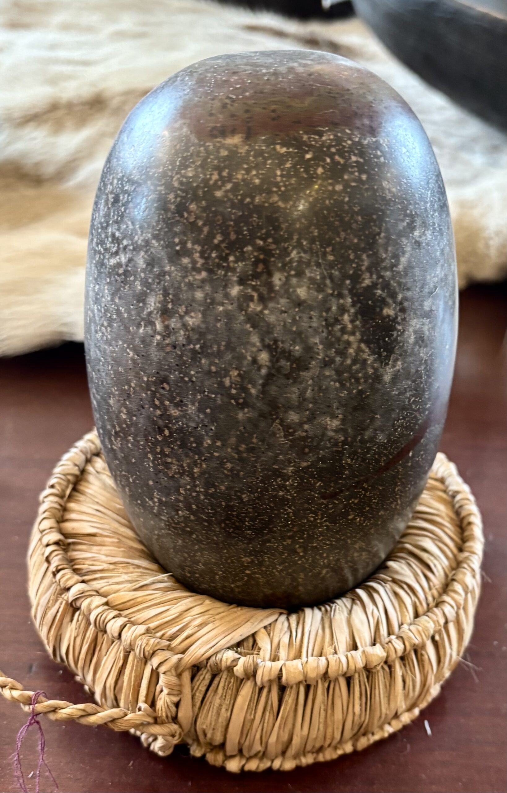 Shiva Lingam Stone from the Narmada River in India. It is a Sacred Ovoid Stone Representing both Male and Female Energies and Symbolizes Fertility and Balance.